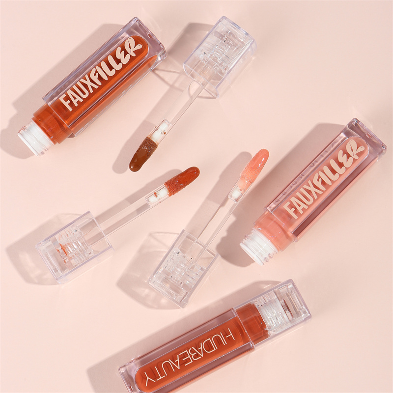ลิปกลอส Huda Beauty Faux Fille - Huda Beauty Makeup Bag บทวิจารณ์และราคา